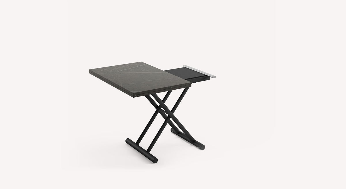 Table relevable moderne en AMELIE Mélaminé Pierre grise avec piètement noir, idéale pour optimiser l’espace dans un salon ou un petit appartement.