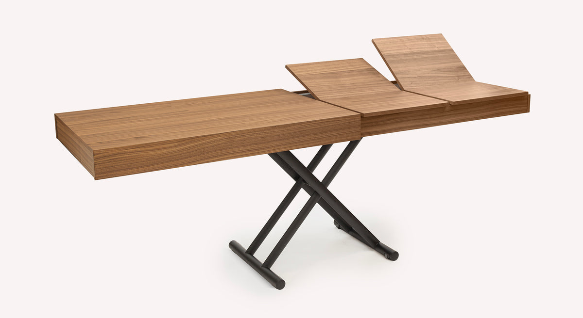 Table extensible Boston en bois avec pieds croisés noirs, partiellement déployée