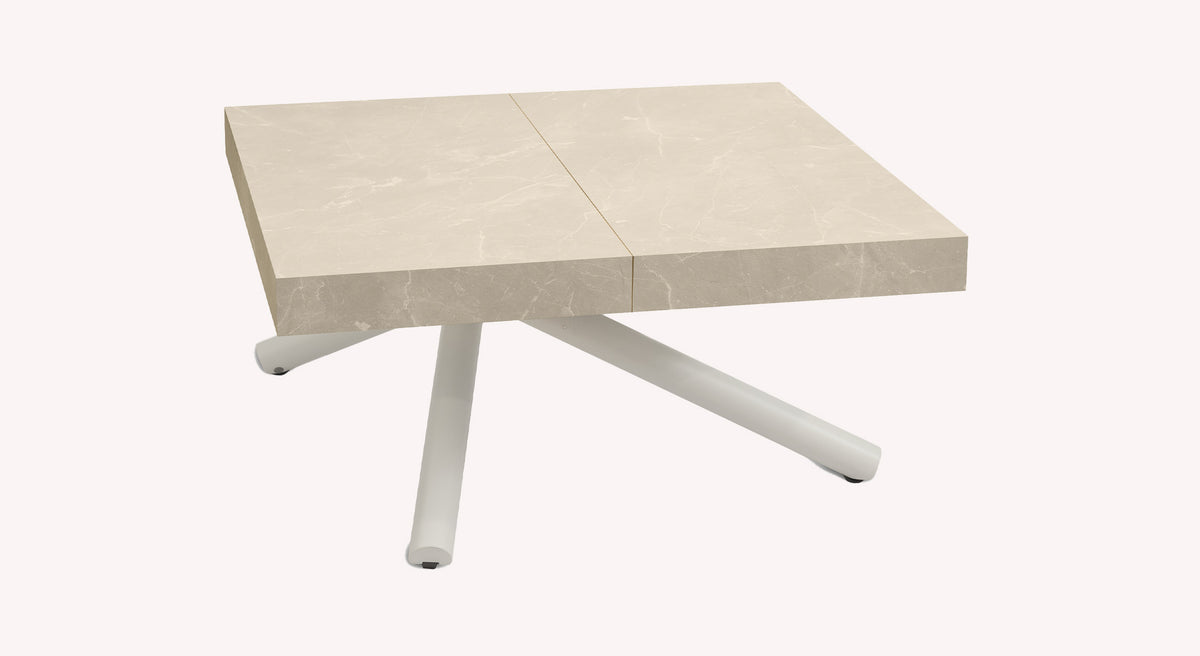 Table extensible Levante avec plateau en marbre beige et pieds blancs croisés