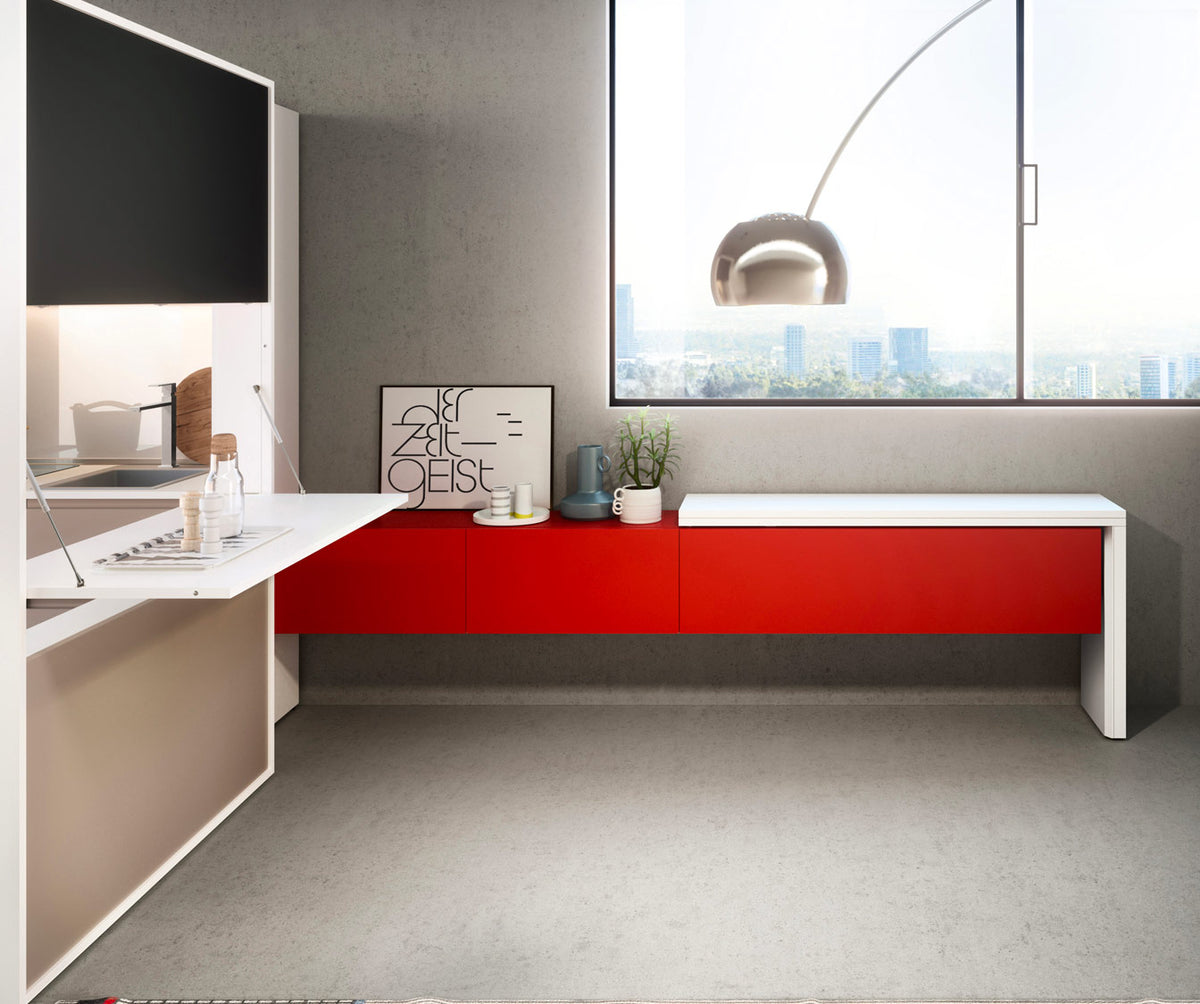 Espace de vie moderne avec meuble bas rouge et blanc, éclairage naturel généreux, décoration minimaliste, illustrant le style contemporain de GIRO +50 coloris & matériaux.