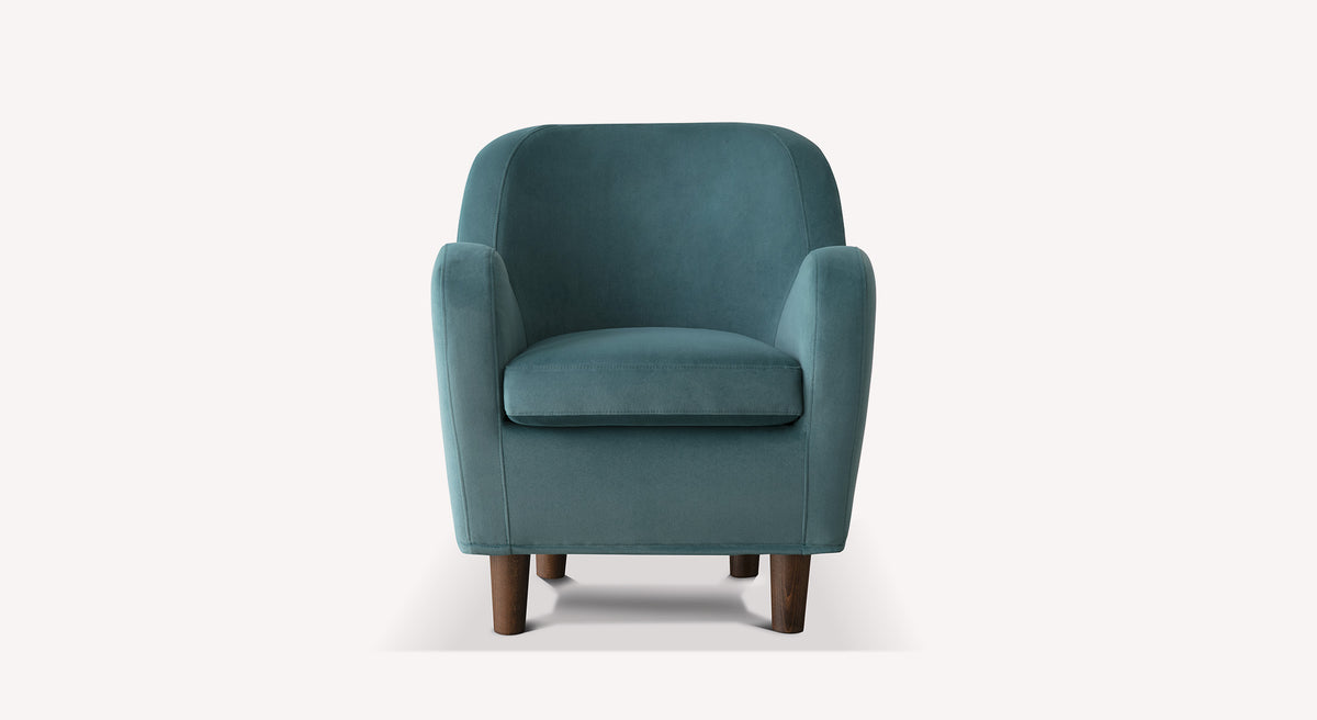 Fauteuil Bowa en velours vert mat avec pieds en bois, design moderne et élégant