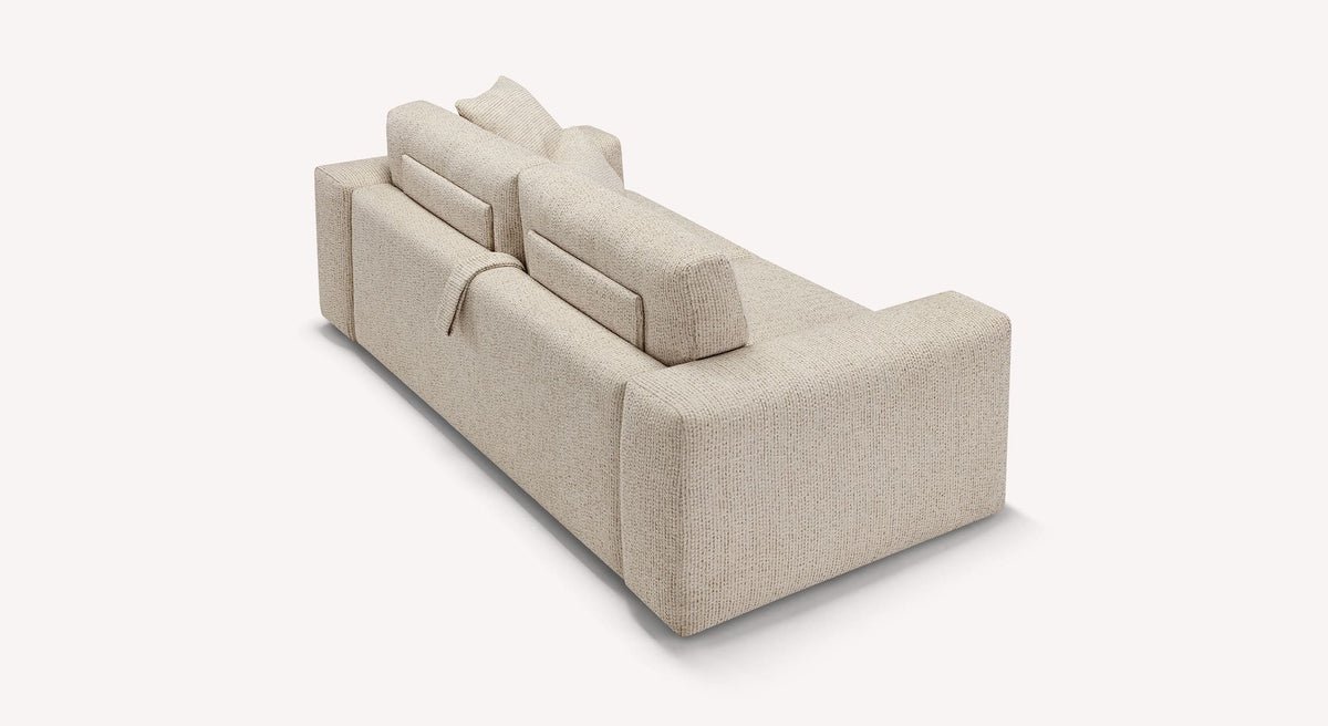 Canapé convertible DOLLY Silencio Ivoire avec tissu beige clair, angles arrondis et coussins de dossier rectangulaires pour un couchage confortable au style contemporain.