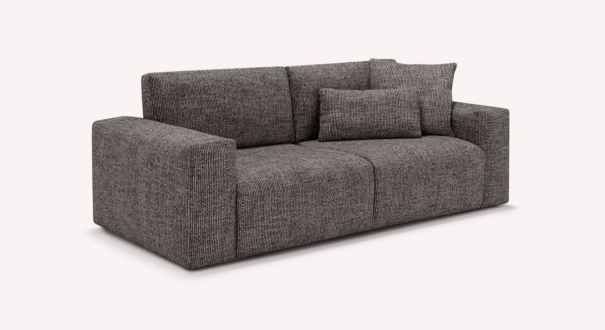 Canapé convertible DOLLY Fixe Silencio Ardoise en tissu gris ardoise avec coussins assortis, idéal pour un couchage quotidien confortable.