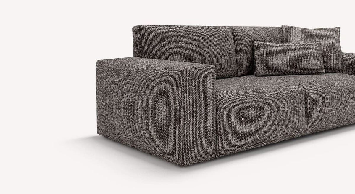 Détail du canapé convertible DOLLY Fixe Silencio Ardoise en tissu gris ardoise, avec coussins assortis, offrant un confort élégant et moderne.