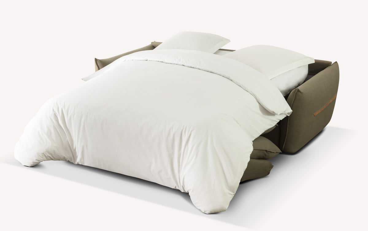 Canapé convertible Elie ouvert en tissu ibis saule avec literie blanche