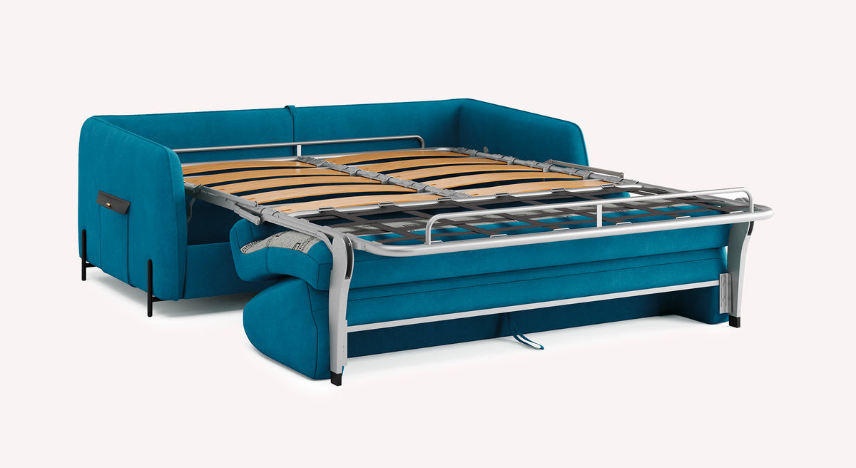Canapé convertible Horus en tissu velours mat couleur pétrole, déplié pour montrer le cadre du lit