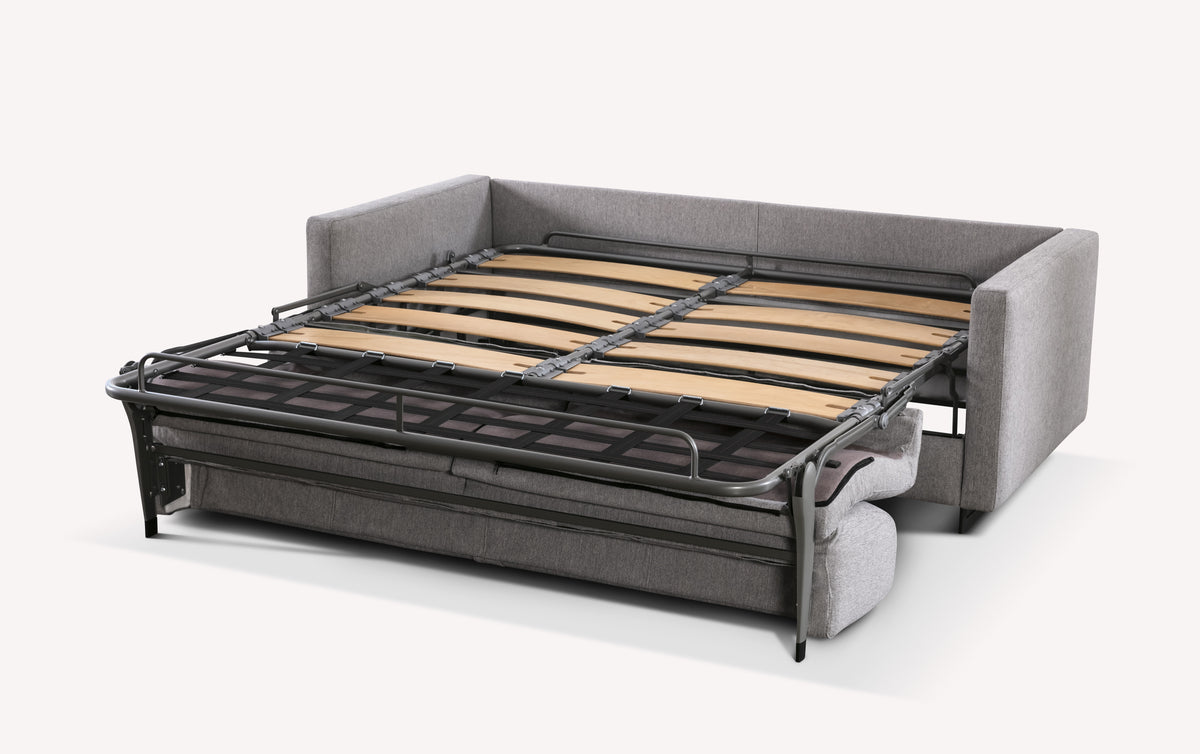 Canapé convertible JUSTIN Gemma Silver en tissu gris, structure métallique avec sommier à lattes pour un couchage quotidien confortable.