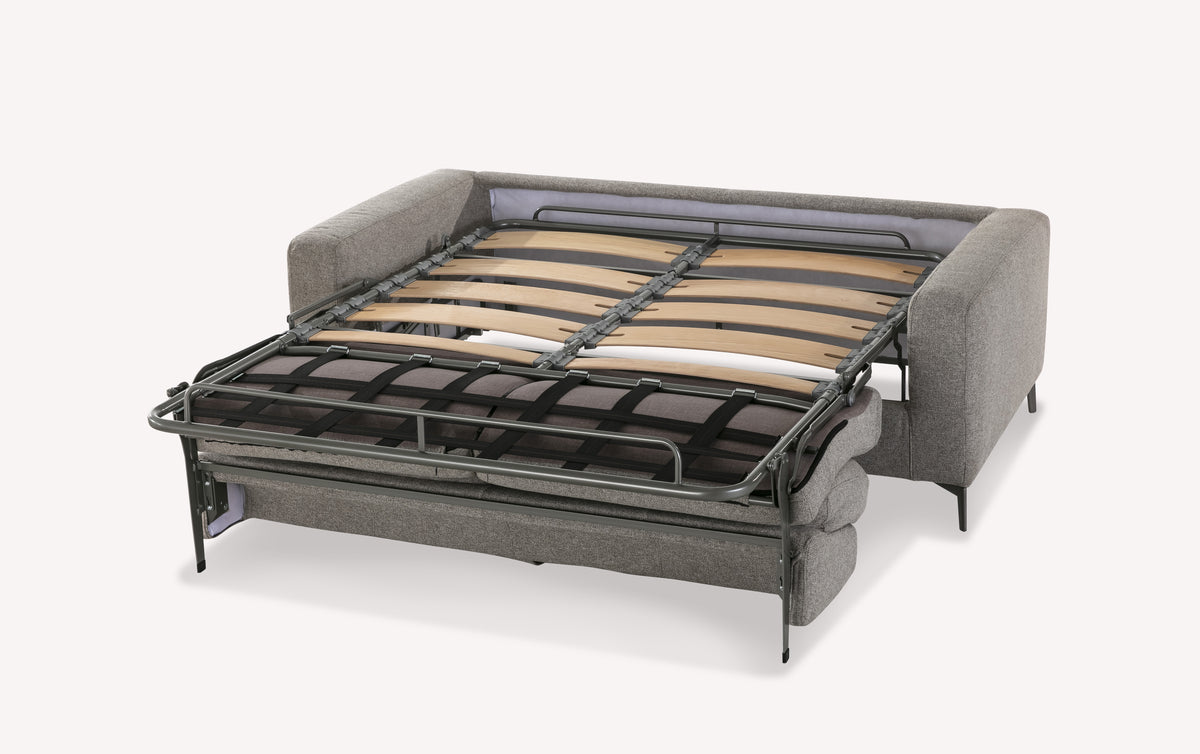 Canapé convertible Lisbona en tissu blend étain, structure dépliée montrant le sommier à lattes