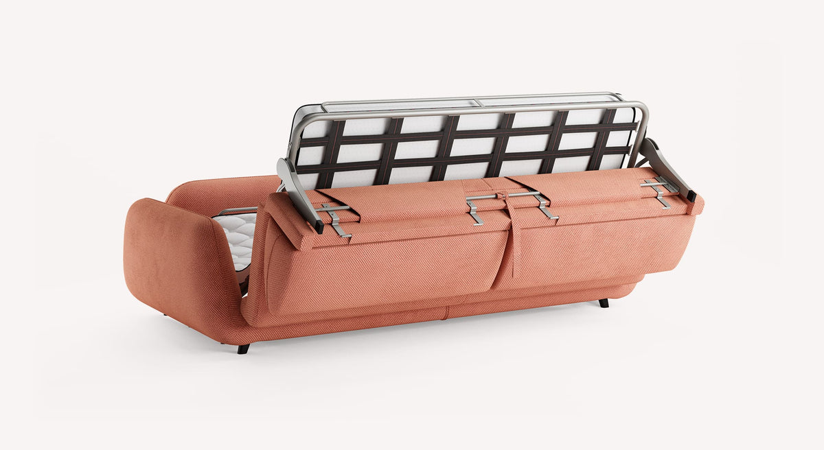 Canapé convertible MOON Moby Corail en tissu corail avec mécanisme metalique visible pour couchage quotidien, offrant un confort optimal et un design moderne.