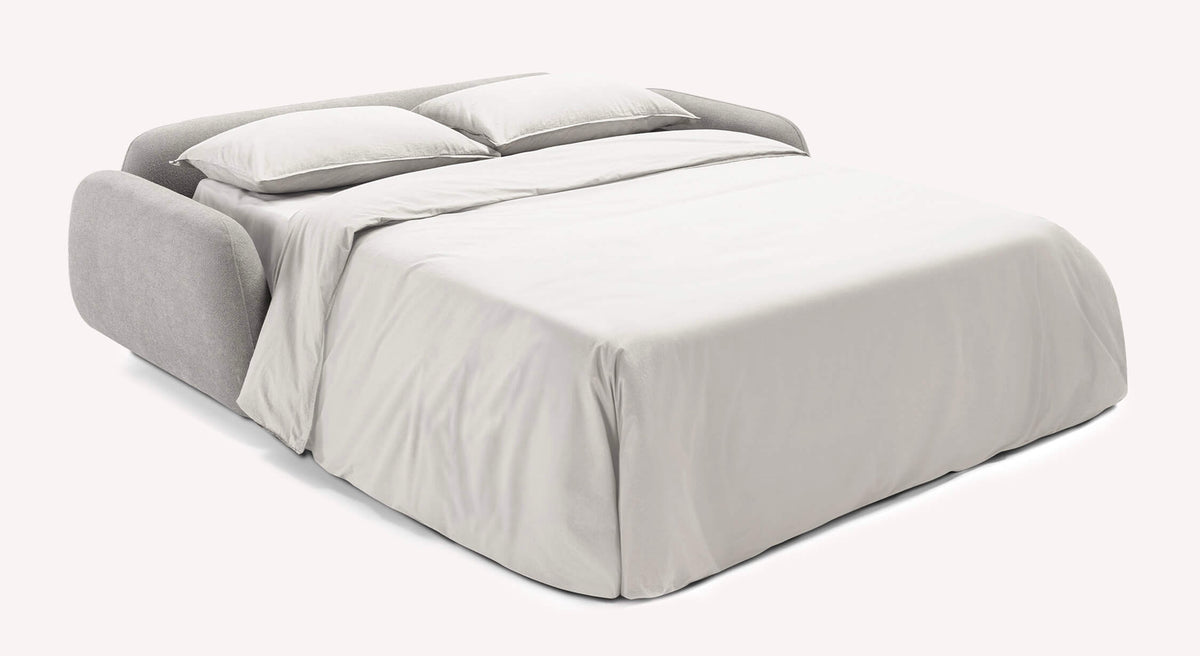 Canapé convertible MOON Innuendo Etain en tissu gris clair, transformé en lit avec deux oreillers et une housse de couette beige, design moderne et épuré.