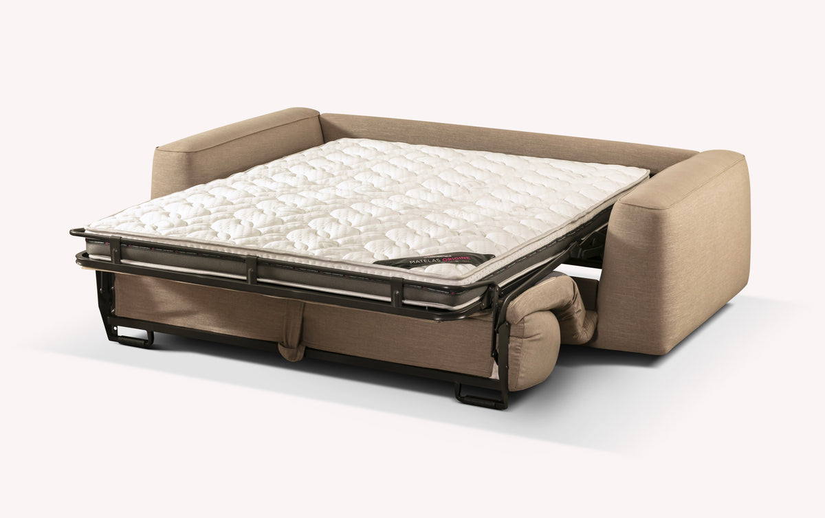 Canapé convertible ONYX +500 tissus & cuirs en tissu beige avec matelas déplié, offrant un couchage quotidien confortable et fonctionnel.