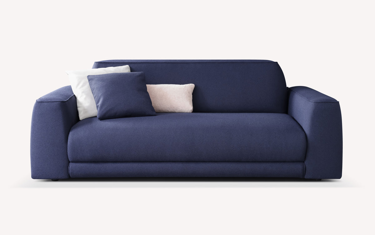 Canapé convertible ONYX +500 tissus & cuirs en tissu bleu foncé avec coussins décoratifs, design moderne et confortable adapté au couchage quotidien.