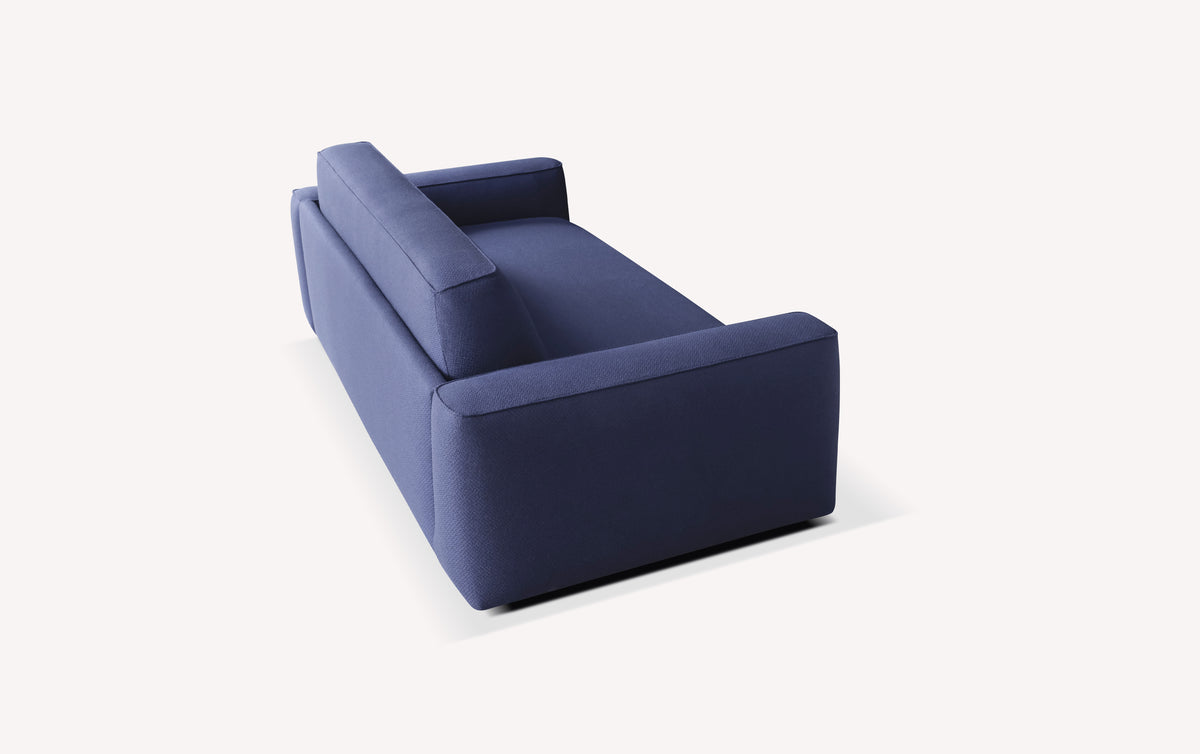 Canapé convertible ONYX +500 tissus & cuirs en tissu bleu profond, design moderne et épuré, idéal pour couchage quotidien avec un confort optimal.