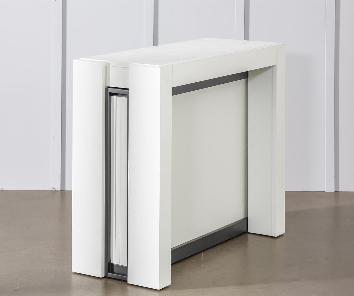 Table extensible compacte de couleur blanche finition bianco spatolato, modèle COMPACT Mélaminé Bianco spatolato, idéale pour optimiser l'espace intérieur.