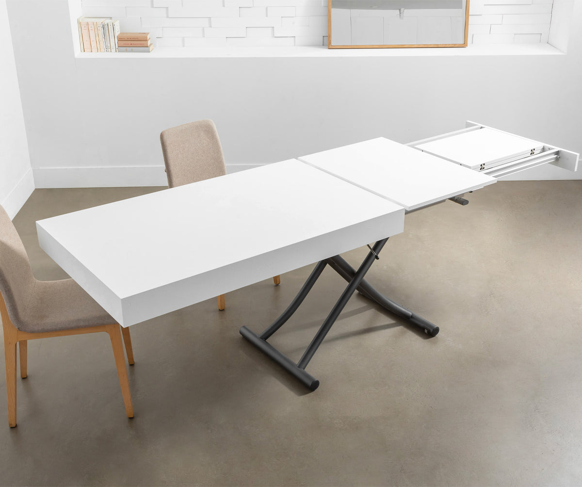 Table extensible design en MÉLANGE Mélaminé Bianco spatolato avec pieds métalliques noirs et plateau blanc éclatant, idéal pour optimiser l’espace dans un intérieur contemporain.
