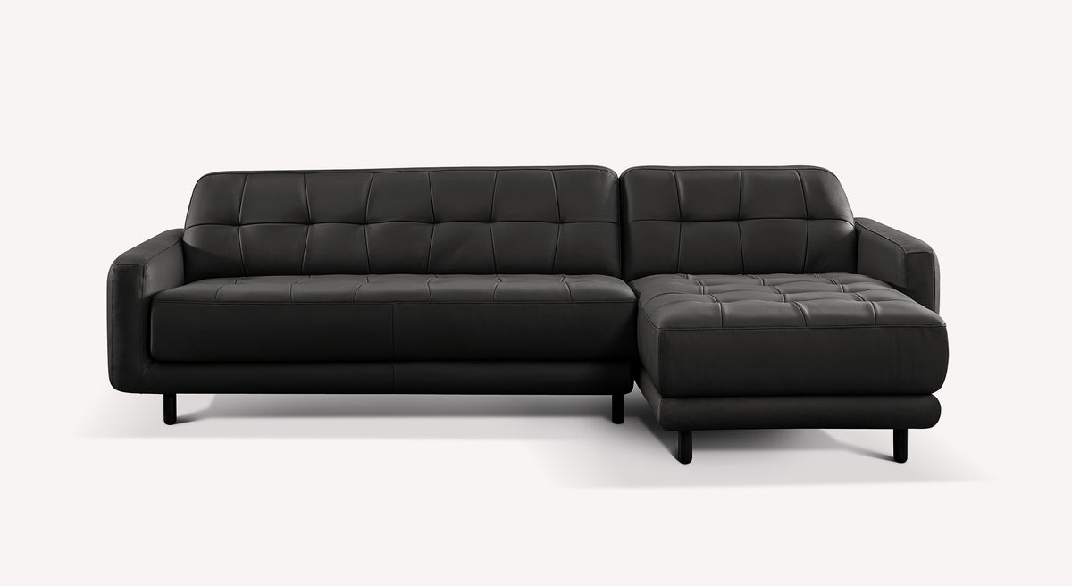 Canapé d'angle en cuir noir modèle Clark, design moderne avec assise capitonnée et accoudoirs épurés
