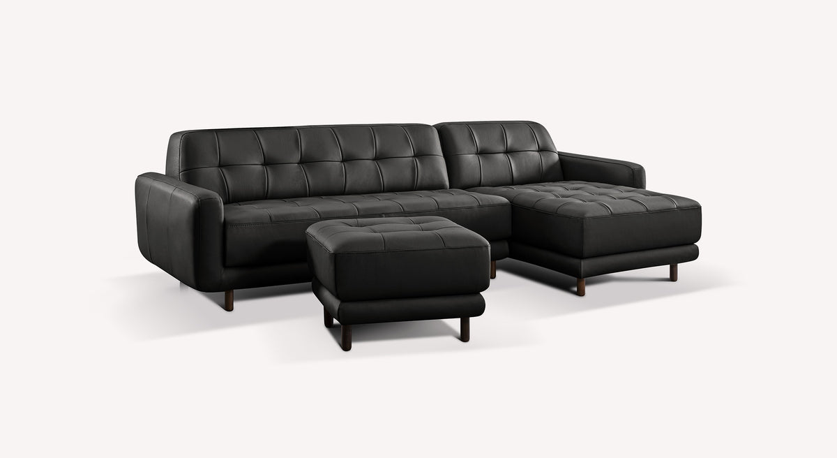 Canapé d'angle en cuir noir Sydney modèle Clark, avec pouf assorti, design moderne et capitonnage élégant