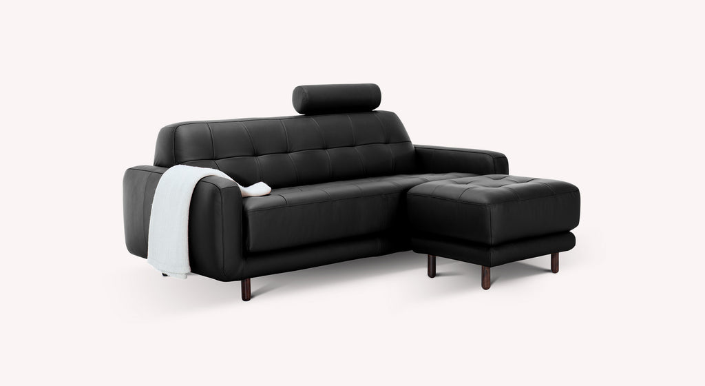 Lot canapé et pouf CLARK Cuir Sidney Noir en cuir noir, canapé convertible avec appui-tête ajustable et pouf assorti pour un confort élégant et moderne.
