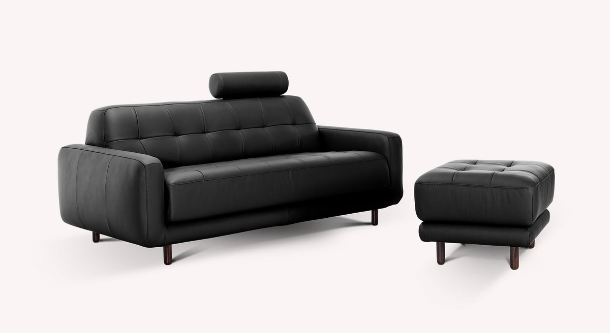 Lot canapé et pouf CLARK Cuir Sidney Noir en cuir noir avec design moderne, comprenant un canapé confortable et un pouf assorti, idéal pour un intérieur élégant et fonctionnel.