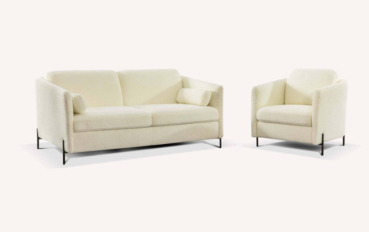 Lot canapé et fauteuil LAPP en tissu bouclette ivoire avec structure fine noire, design moderne et élégant pour un espace de vie confortable et contemporain.