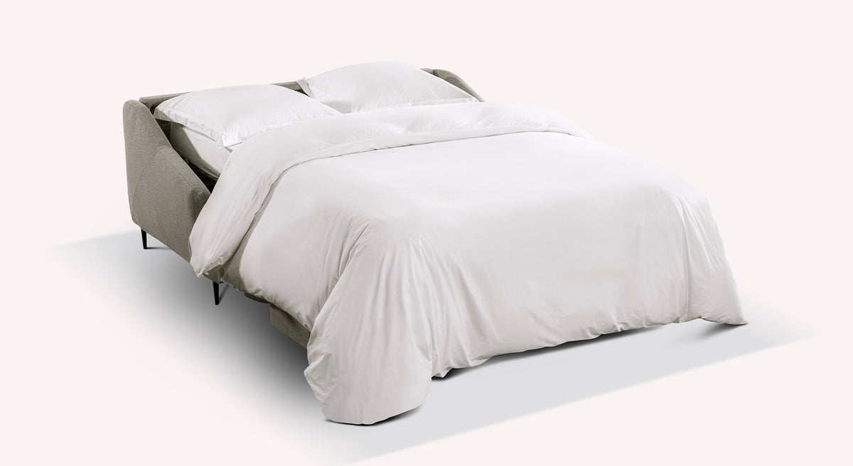 Canapé convertible Layne ouvert avec draps blancs, modèle Tixer Pepper 4