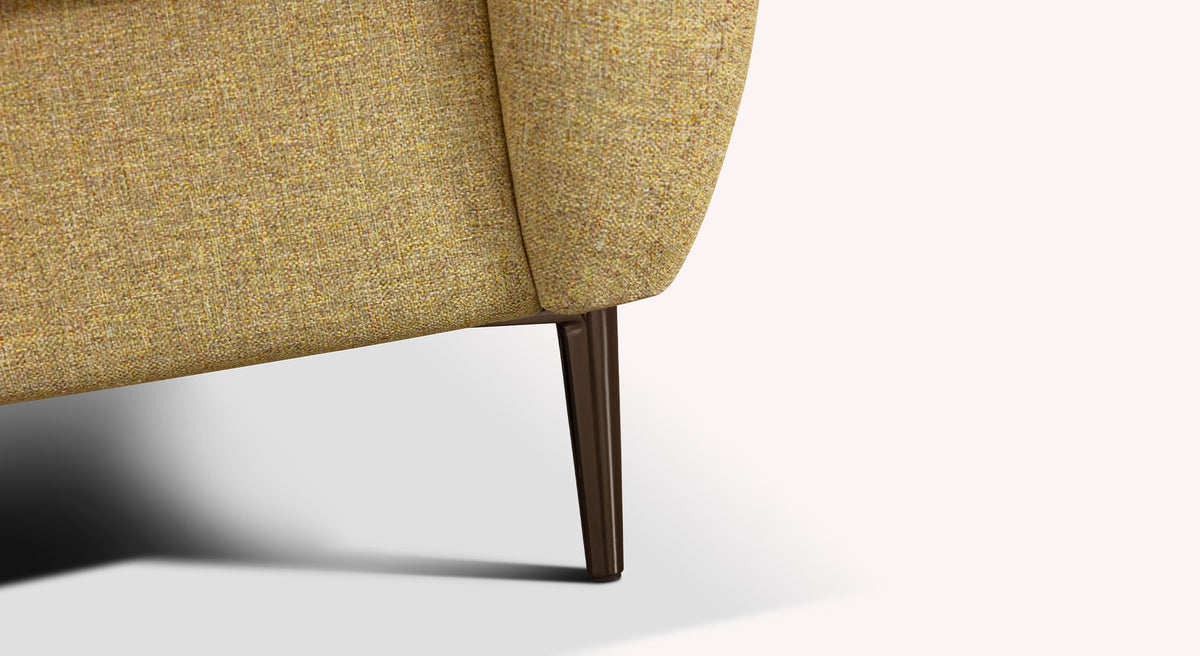 Pied en bois d'un canapé convertible Layne Tixer Naples, tissu beige texturé