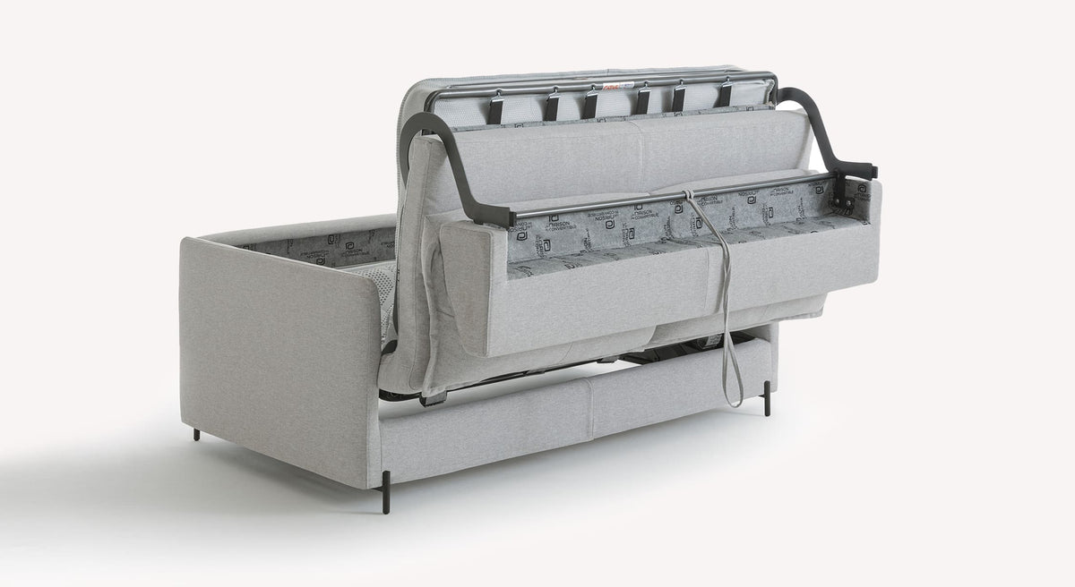 Canapé convertible SERGE Tixer Silver en tissu gris clair avec structure métallique visible, mécanisme ouvert montrant le pliage du couchage et le cadre du canapé.