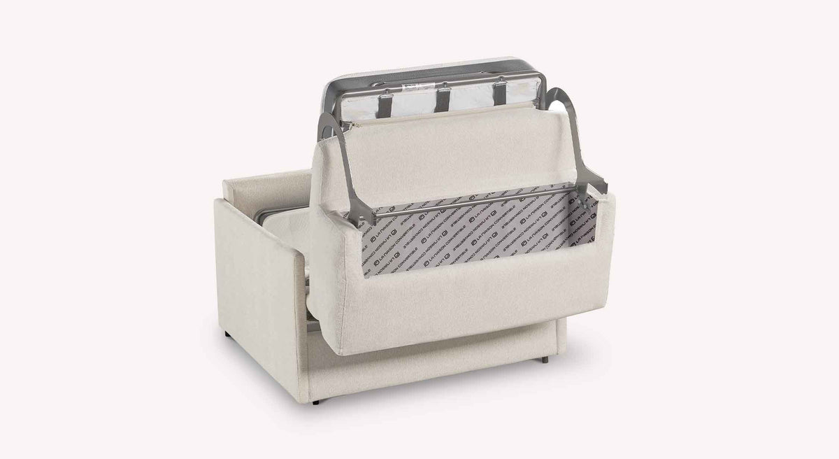 Fauteuil JERRY Compact Misterio Ivoire en tissu clair avec structure métallique dépliée, illustrant son mécanisme compact et fonctionnel pour couchage quotidien.