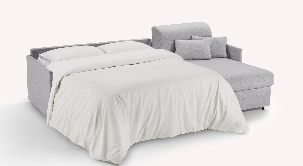 Canapé convertible Jerry compact ouvert en angle, tissu gris Denver Silver, avec lit déplié et coussins assortis