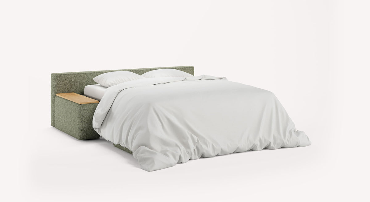 Lit convertible avec un grand couchage blanc, appui-tête en tissu olive et accoudoirs intégrant un coffre en bois, modèle MAX Accoudoirs Coffre Compact Bois Mariclo Olive.