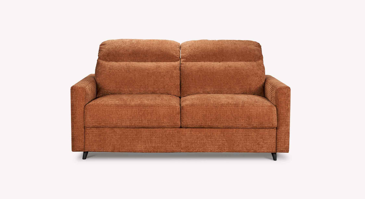 Canapé convertible MOTUS Paradoxe Cuivre en tissu cuivre avec assise confortable et design moderne, idéal pour un couchage quotidien dans un intérieur contemporain.