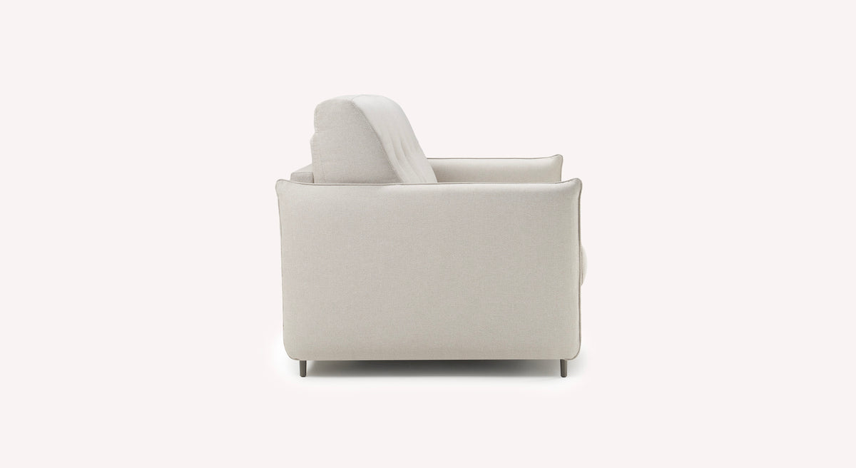 Canapé convertible Tony en tissu ivoire, vue latérale, design moderne et épuré