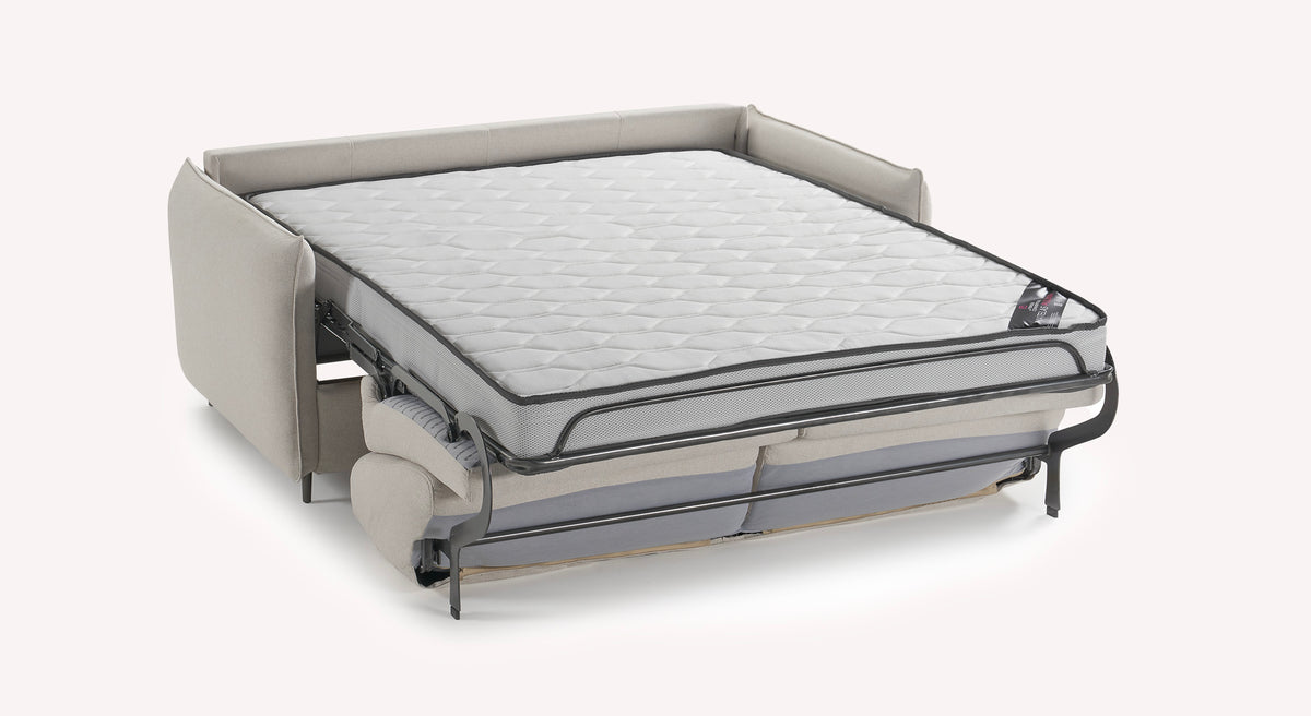 Canapé convertible Tony en tissu ivoire, déplié avec matelas visible