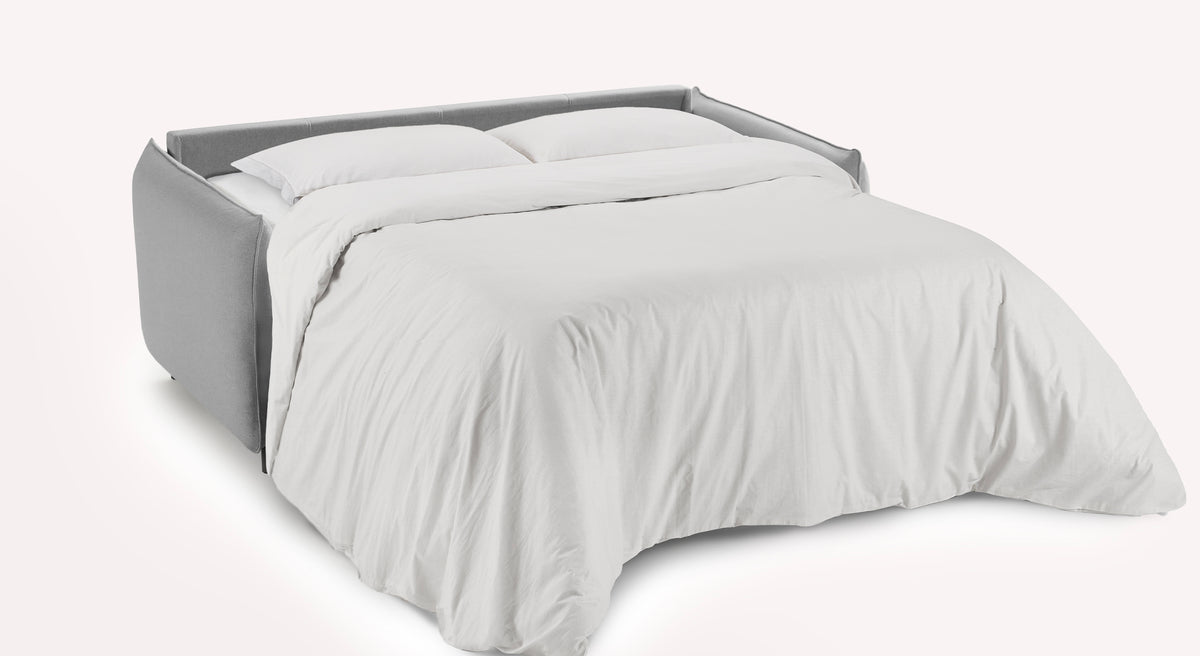 Canapé convertible Tony ouvert en tissu gris étain, avec literie blanche