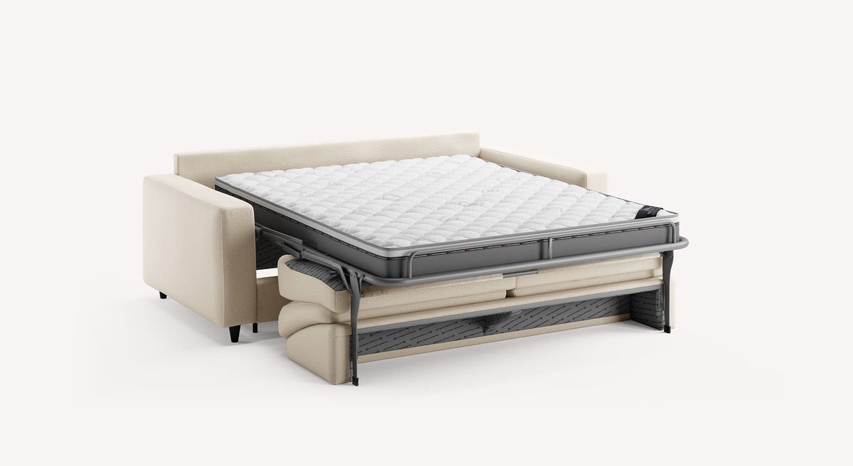 Canapé convertible Alba en tissu ivoire, déplié en lit avec matelas visible