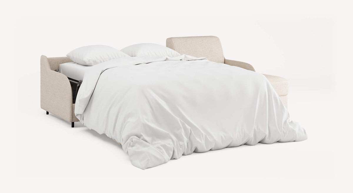 Canapé convertible ALIX Compact Angle Denver Naturel ouvert en lit avec une literie blanche, offrant un couchage confortable et pratique pour un usage quotidien.