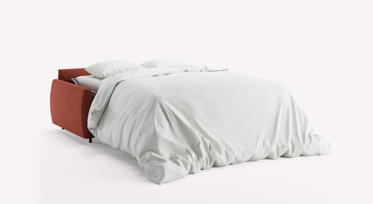 Canapé convertible ouvert, modèle Alix Ovale, tissu Lincoln Terra Rossa, avec draps blancs
