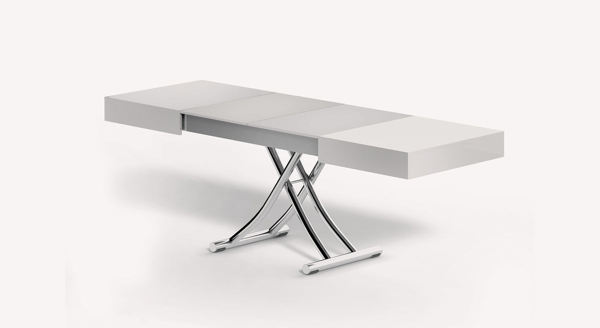 Table extensible moderne en finition BOX Verre Extrachiaro avec pieds métalliques chromés, idéale pour optimiser l'espace et apporter une touche design à votre séjour.