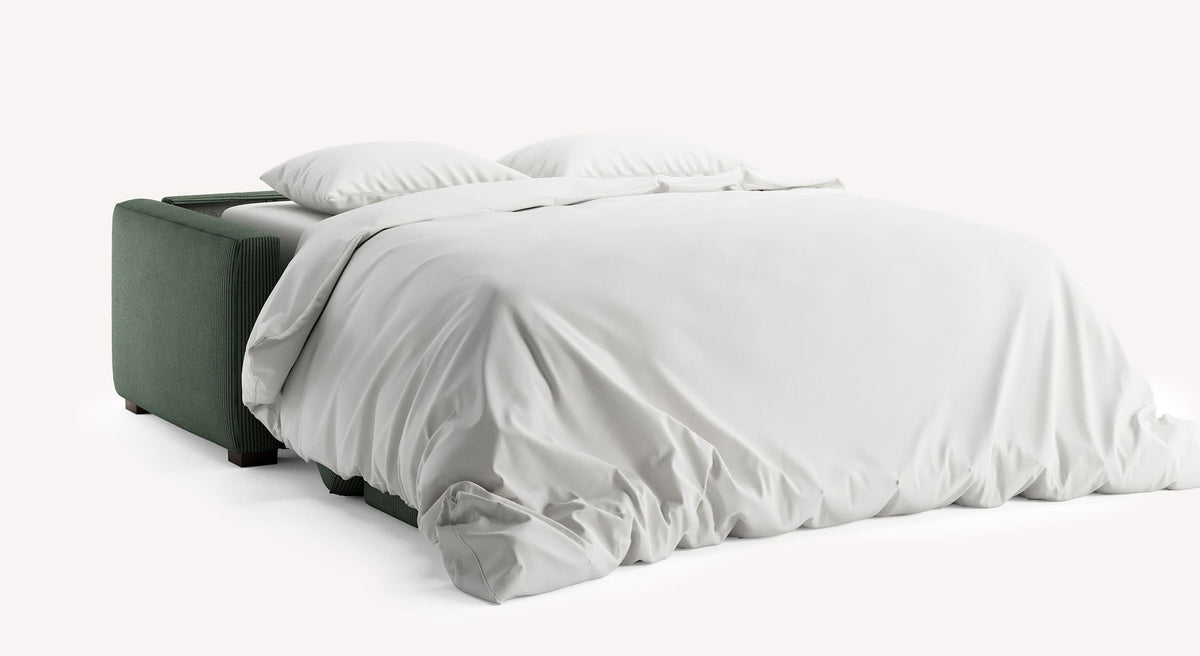 Canapé convertible Cocoon Lincoln sapin ouvert, recouvert de draps blancs