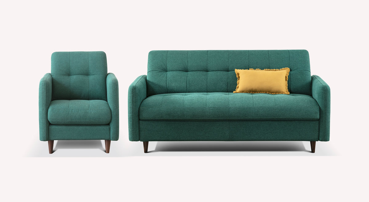 Lot canapé et fauteuil SOHO en tissu vert pétrole avec un coussin décoratif jaune, design moderne et épuré adapté à un intérieur contemporain.