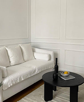 Canapé convertible Lapp blanc dans un salon cosy