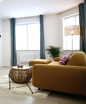 Canapé-lit Clark de profil dans un salon
