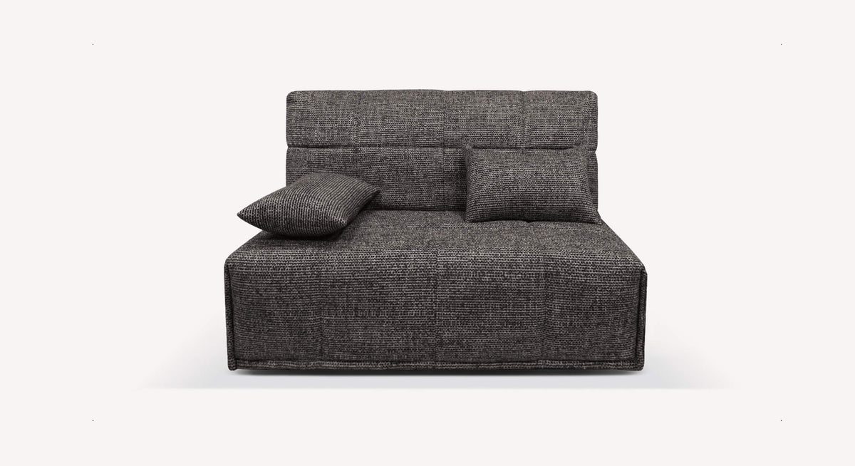 Canapé convertible ADÈLE Silencio Ardoise en tissu gris ardoise avec dossier et coussins assortis, design moderne et compact pour un couchage confortable au quotidien.