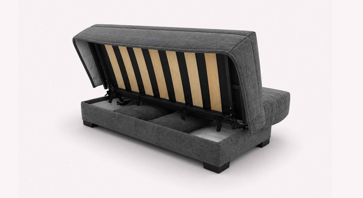 Canapé convertible LEON Misterio Poivre en tissu gris foncé avec ouverture de rangement sous l'assise, idéal pour un couchage quotidien et un gain de place optimal.