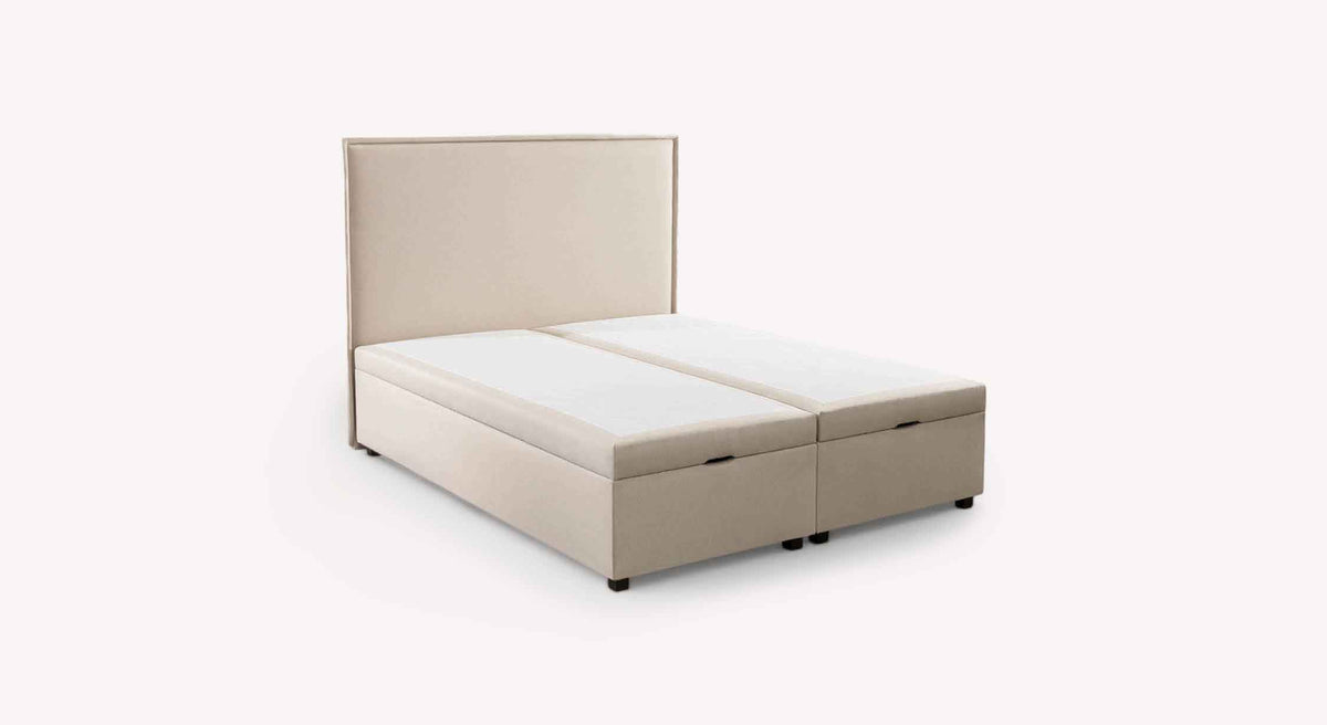 Lit coffre OUESSANT Luca Beige avec tête de lit rembourrée et rangement intégré, offrant un couchage confortable et pratique pour optimiser l’espace dans la chambre.
