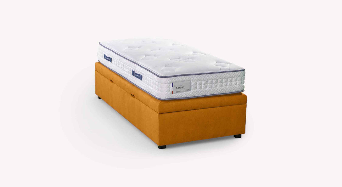 Lit coffre OUESSANT latéral Mine Mango avec matelas épais, design moderne et finition couleur orange, idéal pour optimiser l’espace de rangement dans la chambre.