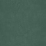 Tissu vert foncé en velours mat, utilisé pour un canapé convertible