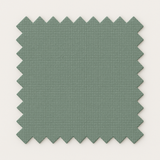 Échantillon de tissu vert amande avec bords crantés