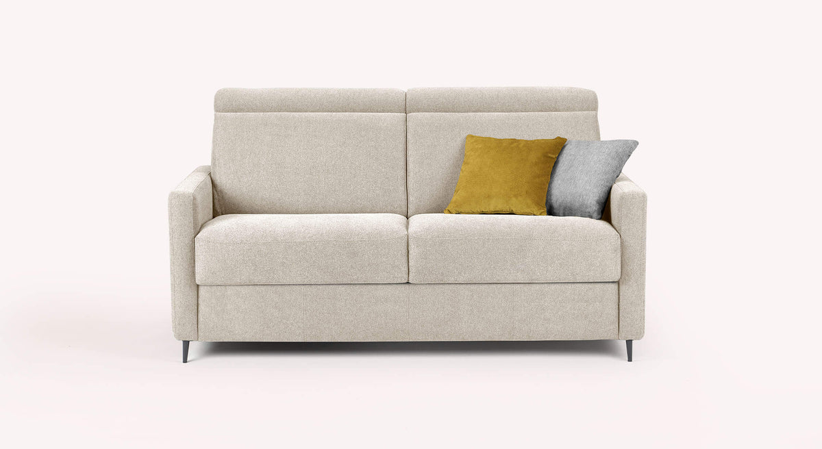Canapé convertible AMY Austin Ivoire en tissu crème avec coussins décoratifs moutarde et gris, design moderne et confortable adapté au couchage quotidien.