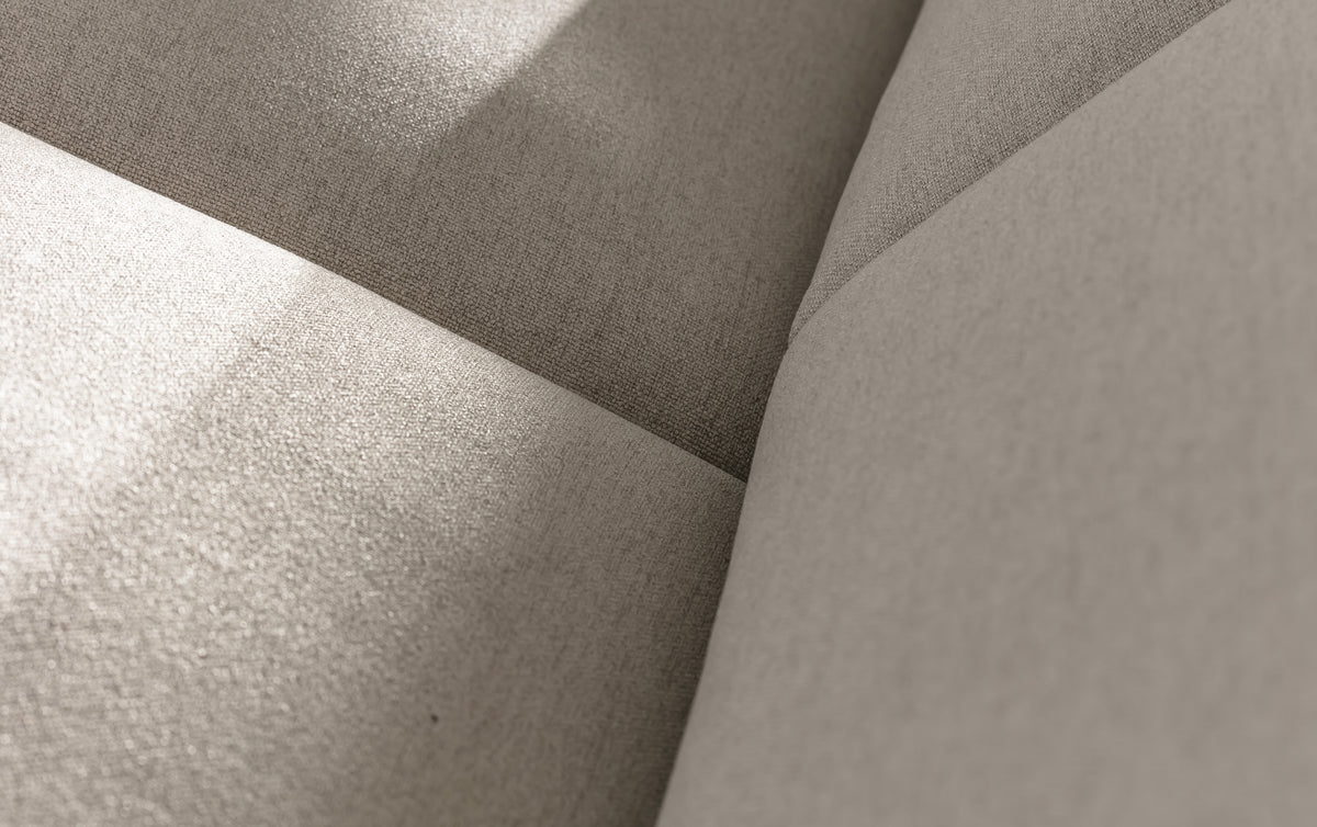 Détail en gros plan du tissu beige clair d’un canapé convertible avec coutures apparentes, illustrant la texture et la qualité du revêtement LYON Fixe Joint Mastic.